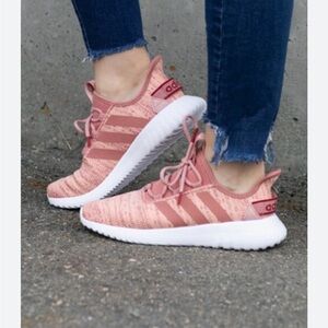 This is a pair of Adidas Kaptir Flow shoes in a coral and beige colorway.